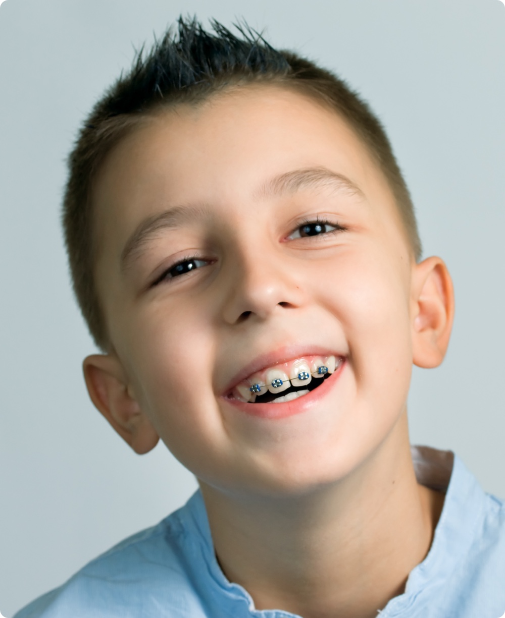 Patient smiling with metal braces