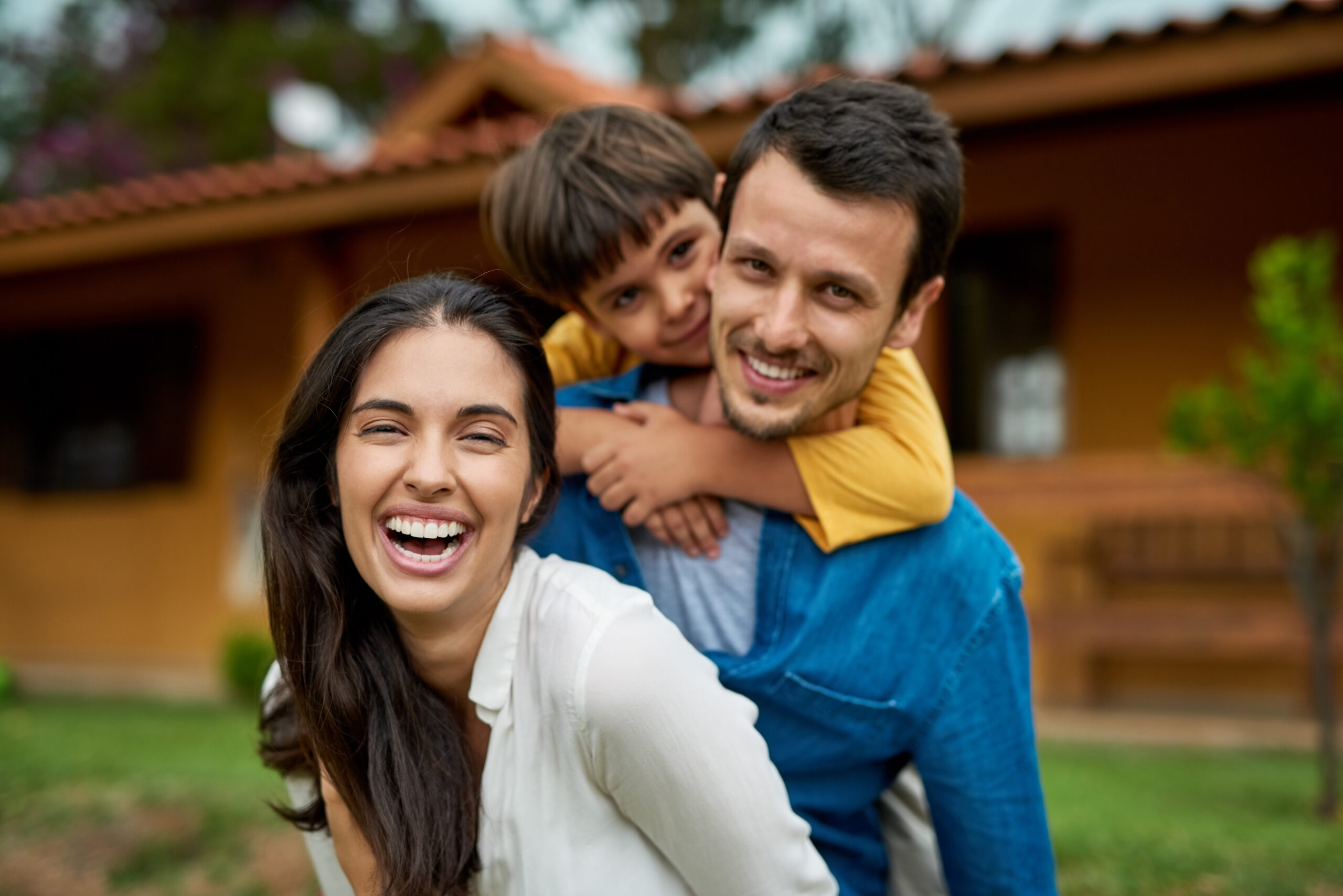 group of young adults smiling and laughing
