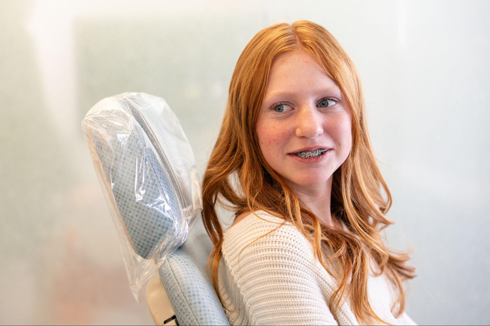 Patient with metal braces from Littleton.